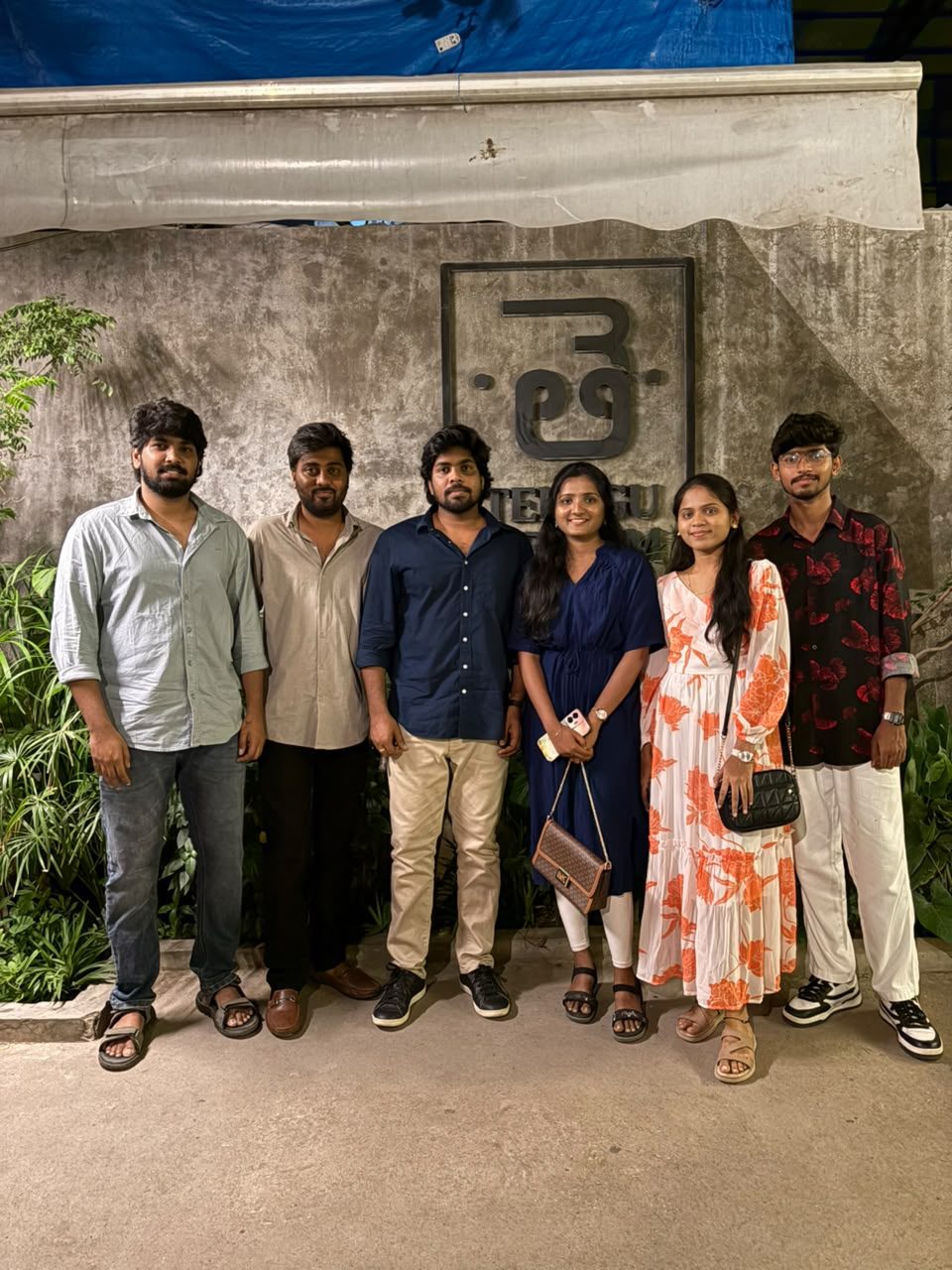 Both families' cousins and brothers together at dinner